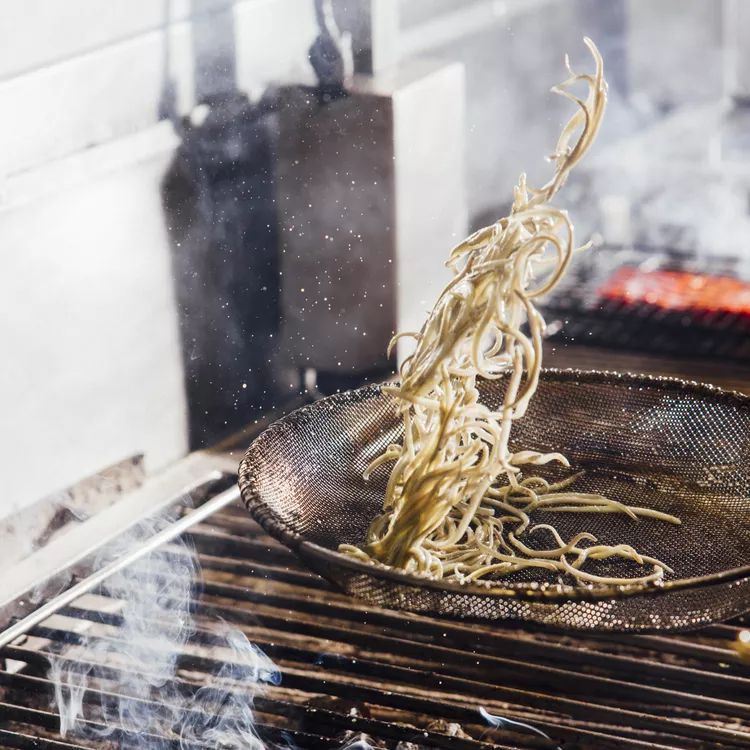 Gulas (baby eels) being cooked at Asador Etxebarri.