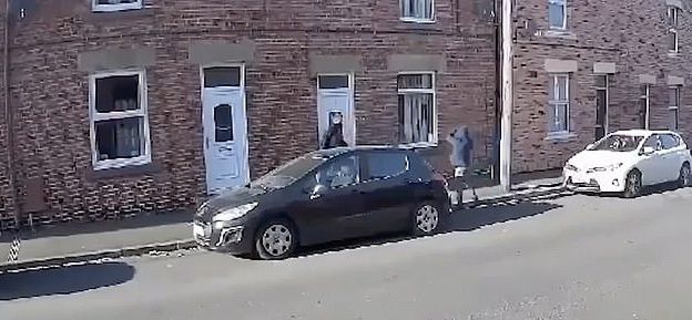 A camera caught the moment a gunman shot a dad de@d through a broken window on residential terraced street in County Durham, England.