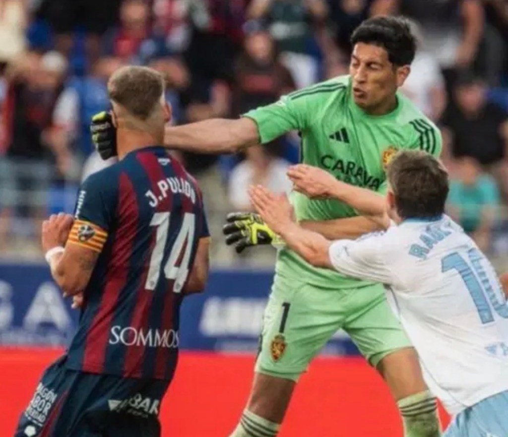 Real Zaragoza goalkeeper Esteban Andrada has been handed a 13-match ban after punching an opponent during a heated Spanish second-division&nbsp;derby.